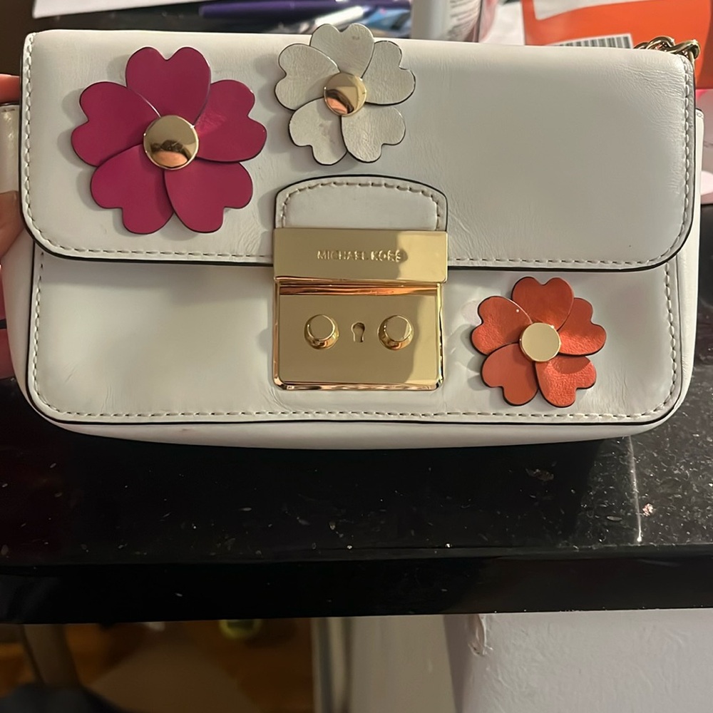 Clutch size Micheal kors purse with clasp and long strap